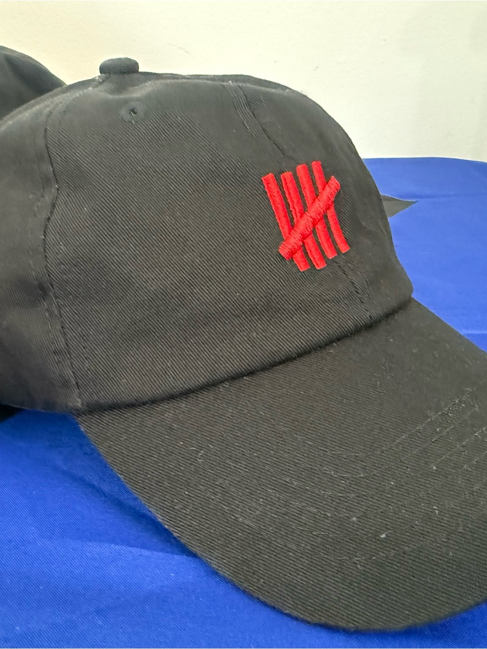 Men’s undefeated Black Baseball Cap - adjustable
